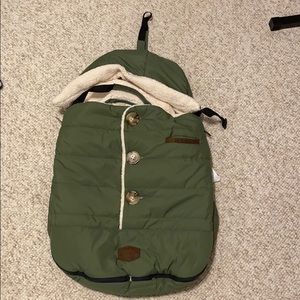 This is a car seat cover for the winter